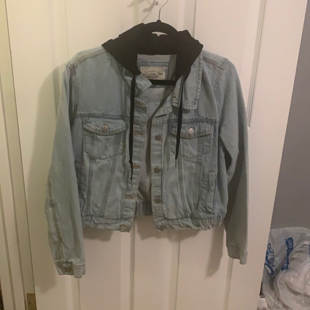 Denim jacket with black hood